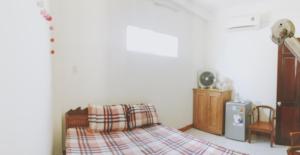 Postel nebo postele na pokoji v ubytování Chang Homestay