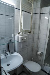Et badeværelse på Hotel Niederräder Hof