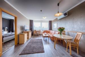 Posteľ alebo postele v izbe v ubytovaní MenDan Magic Spa & Wellness Hotel