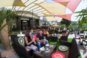 Hostia v ubytovaní MenDan Magic Spa & Wellness Hotel