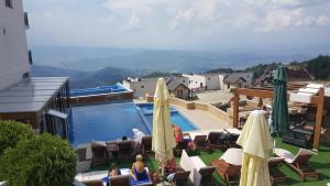 a view of a pool at a hotel at G4 Apartment Milmari in Kopaonik