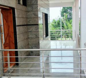 Balkón nebo terasa v ubytování Aashraya Homestay