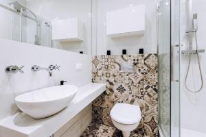 Kúpeľňa v ubytovaní Szpitalna 20 Apartment 3