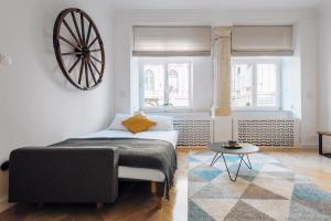 Posteľ alebo postele v izbe v ubytovaní Szpitalna 20 Apartment 3
