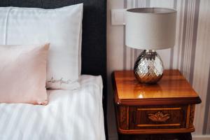 Posteľ alebo postele v izbe v ubytovaní Szpitalna 20 Apartment 3