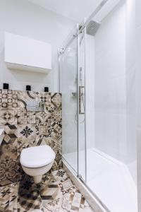 Kúpeľňa v ubytovaní Szpitalna 20 Apartment 3 + 19 fotografií