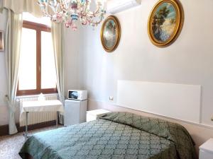 Postel nebo postele na pokoji v ubytování BBTiepolo + 20 fotografií
