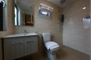 Koupelna v ubytování M&M Hotel