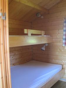 Postel nebo postele na pokoji v ubytování Höfn Cottages