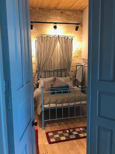 Postel nebo postele na pokoji v ubytování TasEV Guesthouse