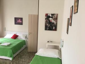 Postel nebo postele na pokoji v ubytování Aliante Turist House