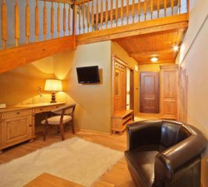TV a/nebo společenská místnost v ubytování Hotel Horní Dvůr