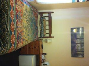 A bed or beds in a room at Aberdeen Guest House 