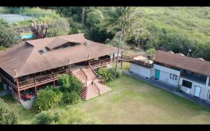 an aerial view of a house with a deck at Hawaii Island Resort in Naalehu