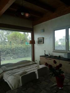 A bed or beds in a room at Villa leonia