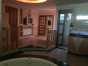 Kuchyň nebo kuchyňský kout v ubytování Motel Monza (Adults Only) + 10 fotografií