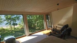 Postel nebo postele na pokoji v ubytování Guest House Vidlauči