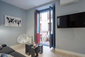 TV a/nebo společenská místnost v ubytování LEEWAYS APARTMENT in FÚCAR