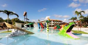 a water park with a water slide and slides at Grand Palladium Imbassaí Resort & Spa - All Inclusive in Imbassai