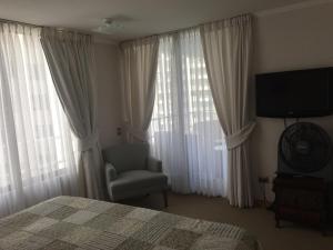 TV a/nebo společenská místnost v ubytování Mar Egeo