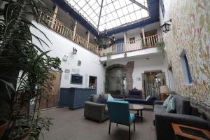 Uma área de estar em Posada Villa Mayor