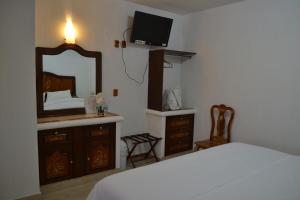 
Cama o camas de una habitación en Hotel Teotihuacan
