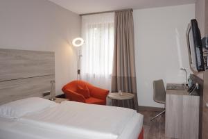 TV a/nebo společenská místnost v ubytování Hotel Kastanienhof