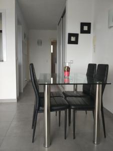 Posedenie v ubytovaní Precioso Apartamento Frente Al Mar