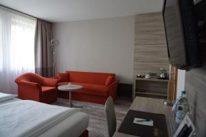 TV a/nebo společenská místnost v ubytování Hotel Kastanienhof