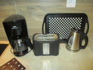 Genex Apartment的咖啡和沏茶工具