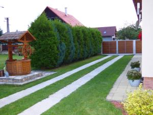 A garden outside Apartmány u Galandu