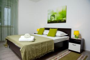 Postel nebo postele na pokoji v ubytování Apartman u srcu grada - Ilićev prolaz
