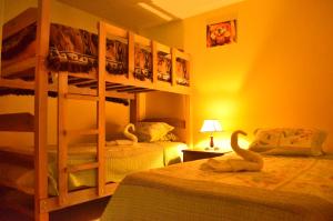 Postel nebo postele na pokoji v ubytování Rosenverg B&B Tours
