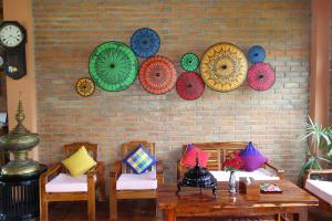 Posezení v ubytování Inle Cottage Boutique Hotel