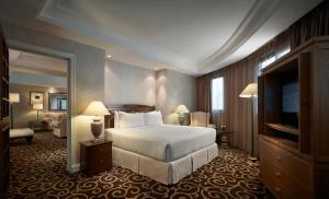 Uma cama ou camas num quarto em Sunway Putra Hotel Kuala Lumpur