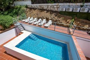 Der Swimmingpool an oder in der Nähe von Luxury Apartments with private swimming pool