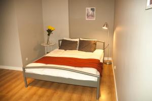 Posteľ alebo postele v izbe v ubytovaní Apartament - Old Town Studio