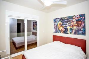 Ein Bett oder Betten in einem Zimmer der Unterkunft Luxury Apartments with private swimming pool