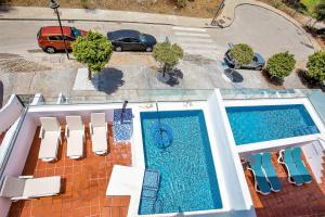 Der Swimmingpool an oder in der Nähe von Luxury Apartments with private swimming pool