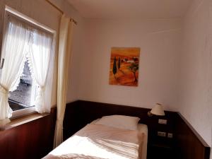 Voodi või voodid majutusasutuse Hotel Restaurant Jägerhof toas