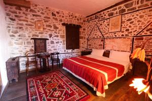 Voodi või voodid majutusasutuse Hotel Tradita toas
