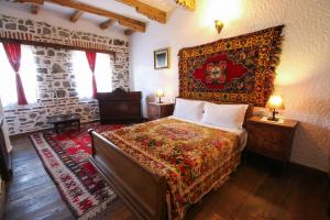 Voodi või voodid majutusasutuse Hotel Tradita toas