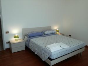 เตียงในห้องที่ Santo Spirito 2 - by Nadia
