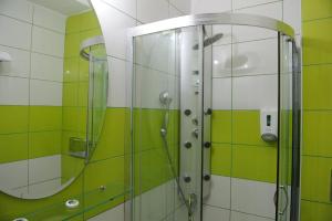 Koupelna v ubytování Adonis City Hotel