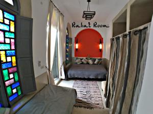 Postel nebo postele na pokoji v ubytování Riad Bel Haj