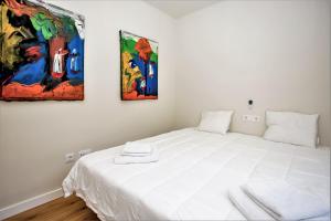 Ein Bett oder Betten in einem Zimmer der Unterkunft Luxury Apartments with private swimming pool