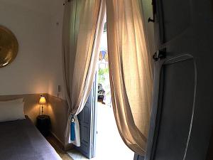 Postel nebo postele na pokoji v ubytování Riad Bel Haj