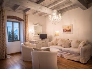TV a/nebo společenská místnost v ubytování Relais Il Pigno