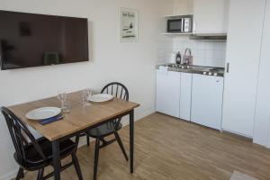 Kuchyň nebo kuchyňský kout v ubytování Biz Apartment Solna + 14 fotografií