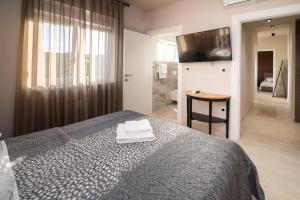 Postel nebo postele na pokoji v ubytování Luxury Apartment Imperia + 28 fotografií